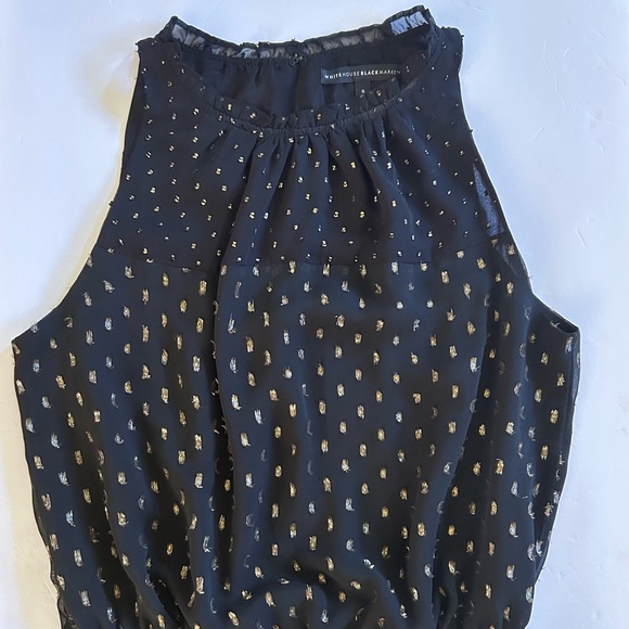 Black and gold sleeveless top. - Picture 1 of 3